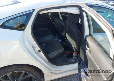 2019 Honda Civic Sport из США, поврежденный, VIN 19XFC2E86KE046017